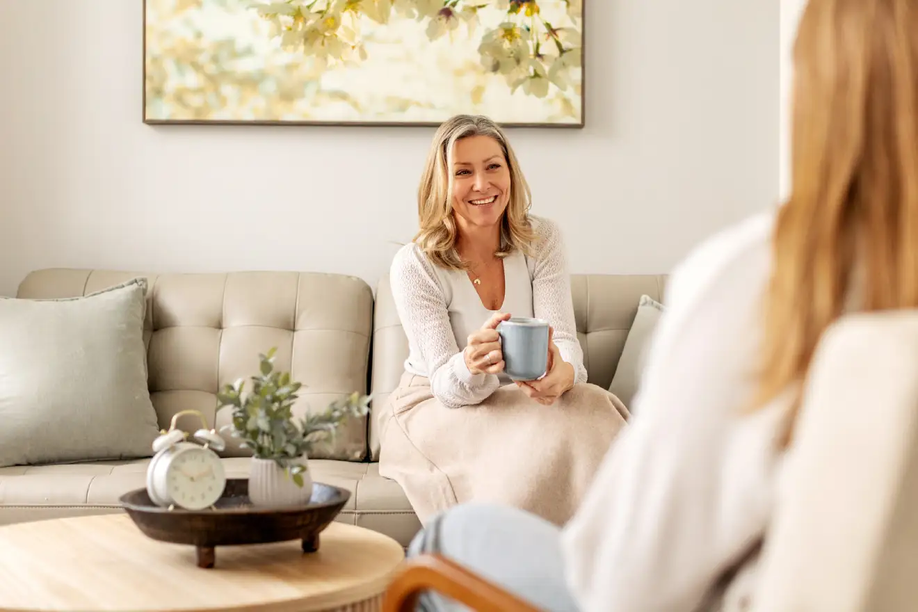 Female therapist speaking with a client during a counselling session at Blue Shores Counselling in Collingwood and Stayner.